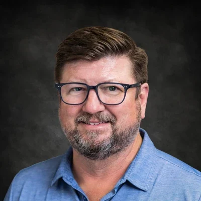 A headshot photo of orthodontist Max Couch, Jr.