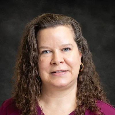 A headshot photo of Michelle