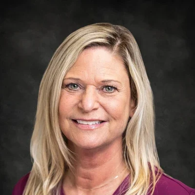 A headshot photo of Molly