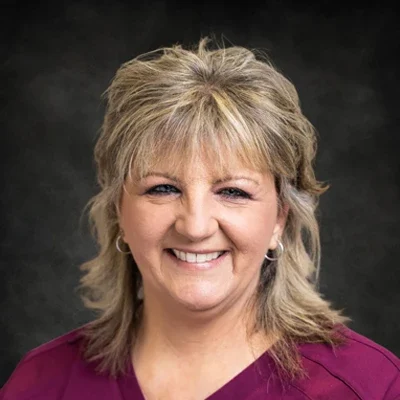 A headshot photo of Shelley